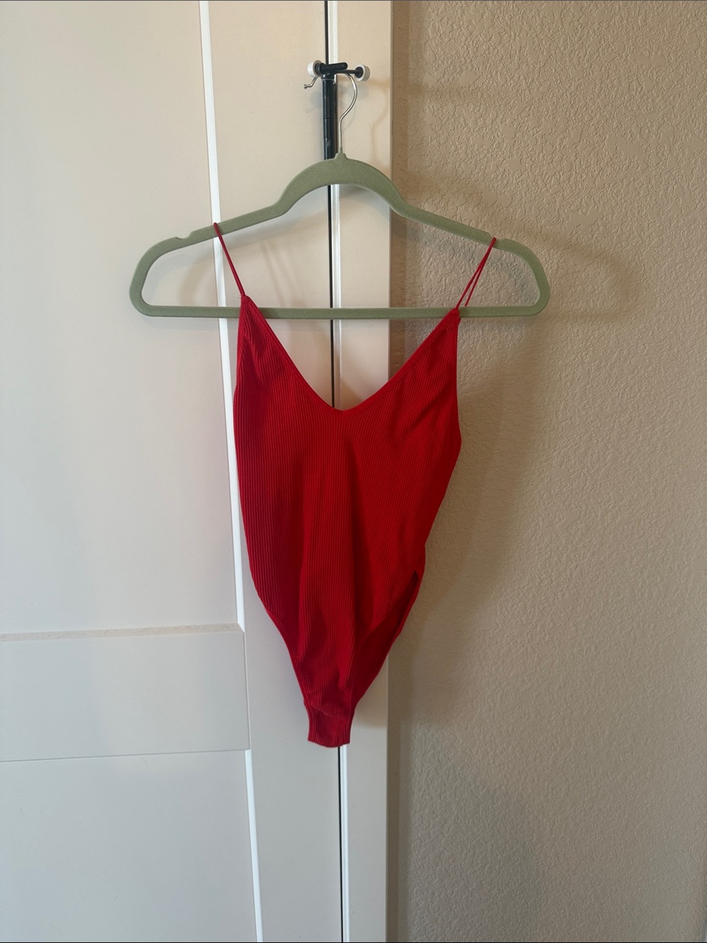 Urban Outfitters Red Ribbed V‑Neck Spaghetti Strap Bodysuit
